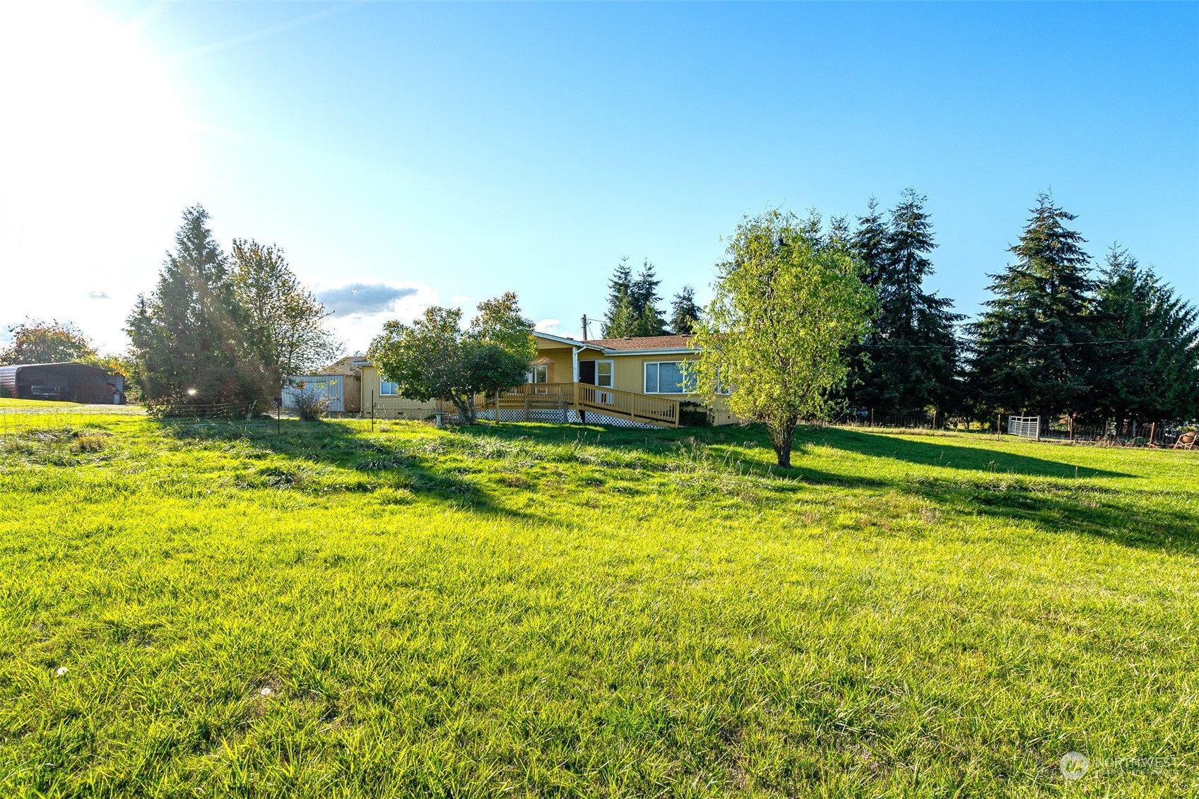 106 # 4 Bay Road Winlock, WA 98596 - Photo 4 of 36 a view of a swimming pool with a yard