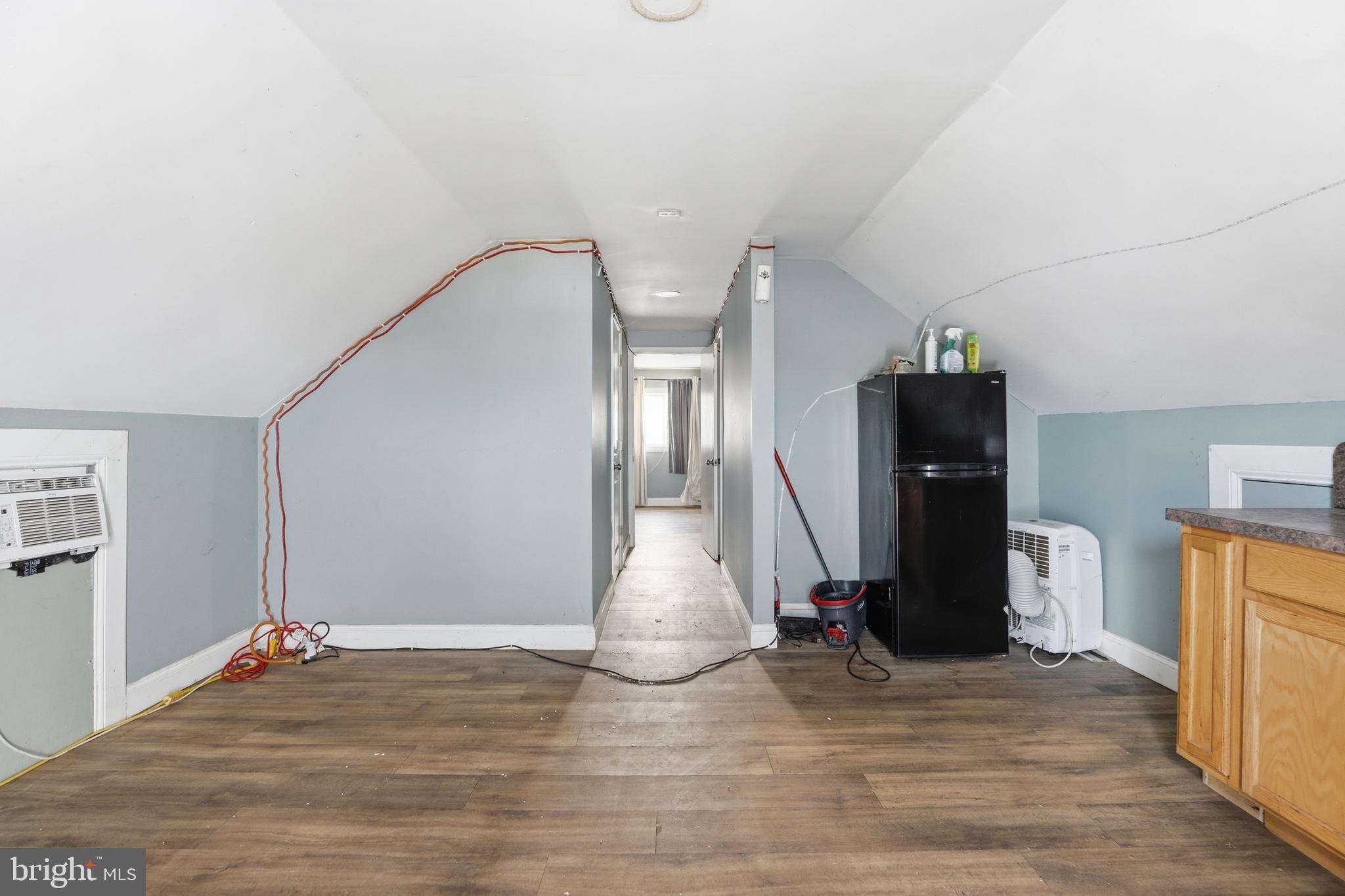 20915 Dover Bridge Road Preston, MD 21655 - Photo 46 of 60 a view of entryway and hall with wooden floor