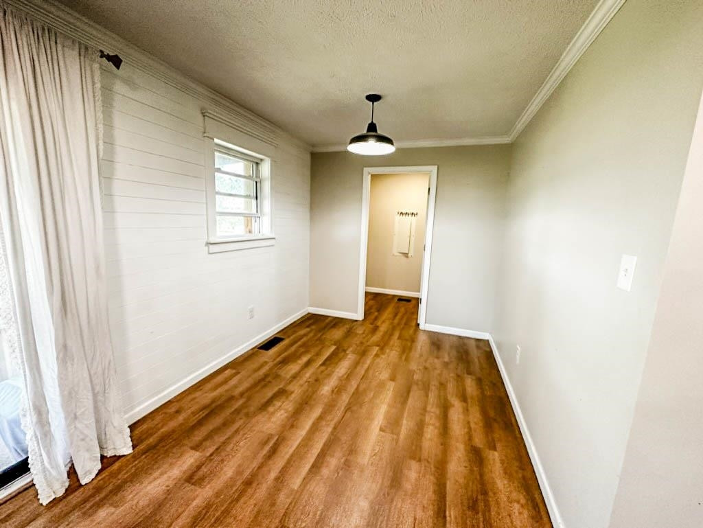 888 Jones Road Bells, TN 38006 - Photo 4 of 21 a view of a bedroom with wooden floor