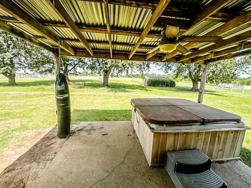 888 Jones Road Bells, TN 38006 - Photo 7 of 21 a view of a backyard with a table and chairs