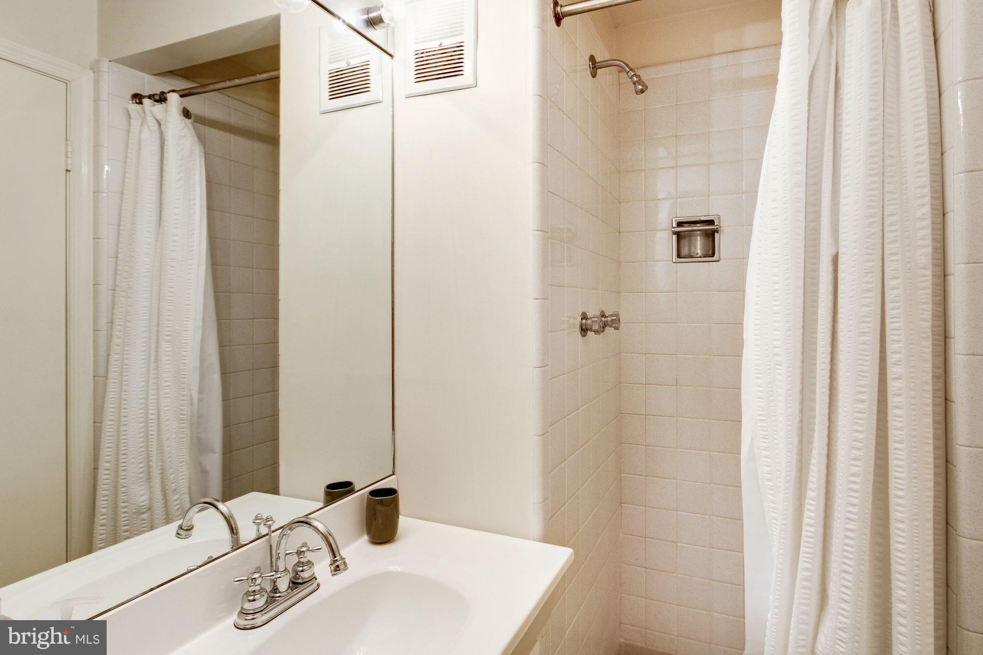7904 Greentree Road Bethesda, MD 20817 - Photo 26 of 30 Lower level full bathroom