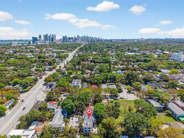 an aerial view of a city with lots of residential buildings