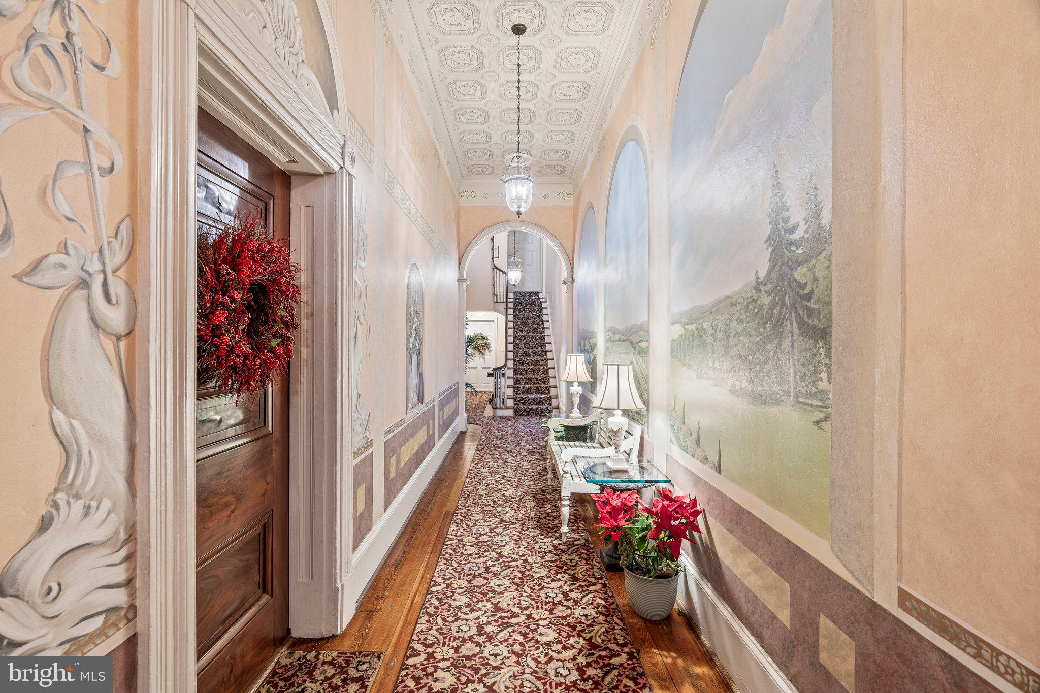 240 South 3rd Street, Unit 2 Philadelphia, PA 19106 - Photo 3 of 8 a view of a hallway with flower pots