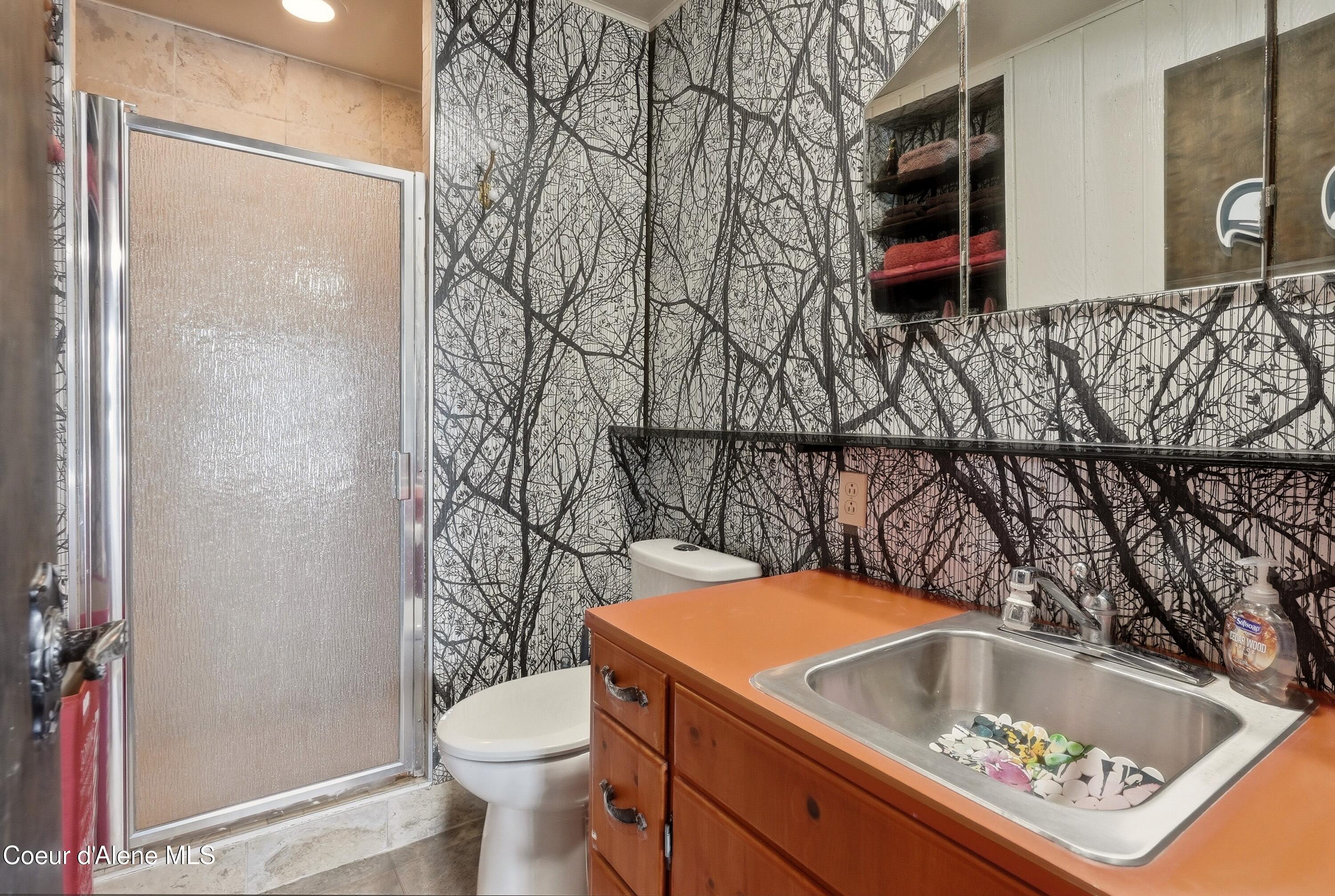 1300 West Glory Road Worley, ID 83876 - Photo 34 of 52 Lower Level Guest Bathroom