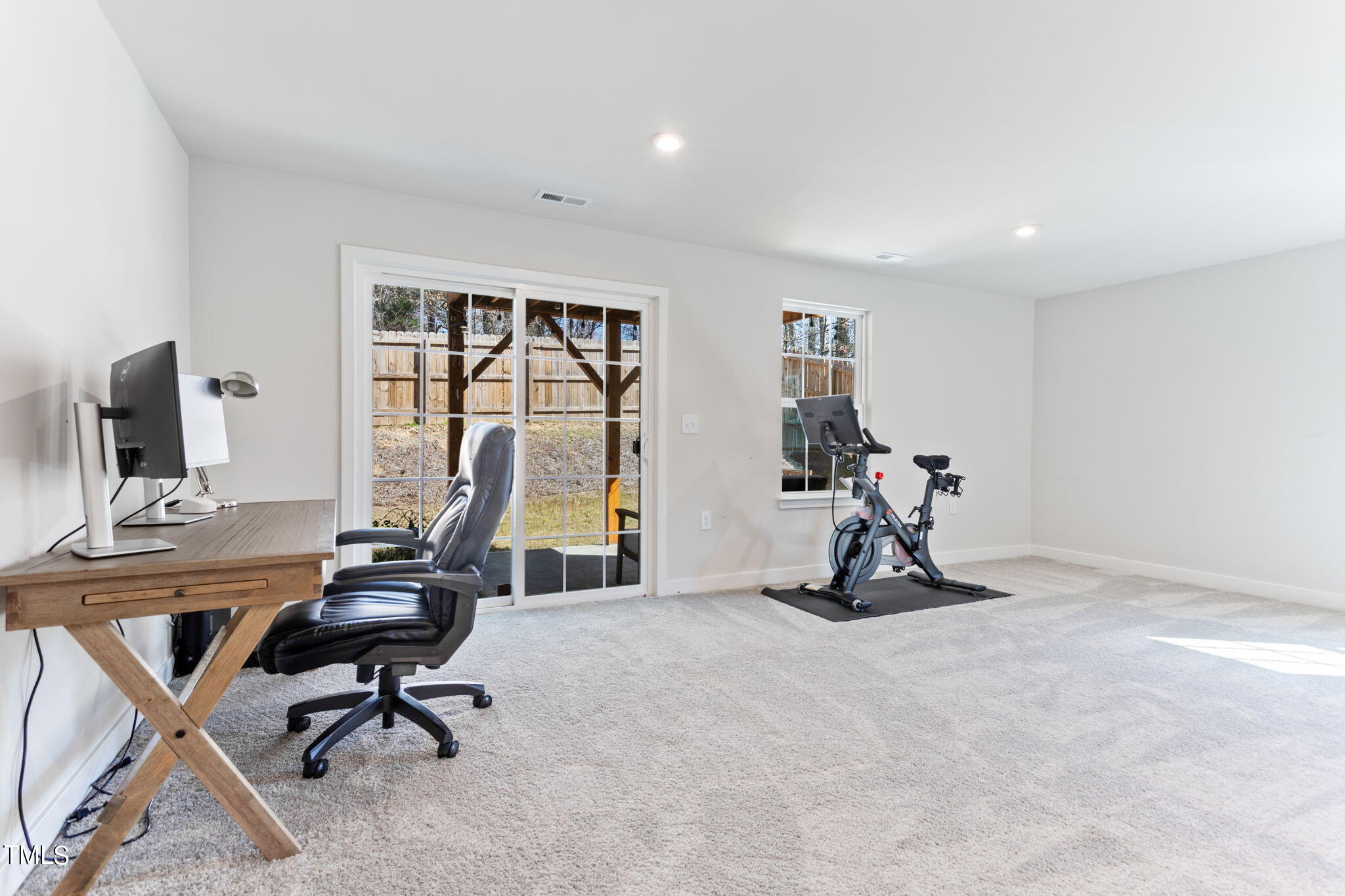 4765 Randall Road Durham, NC 27707 - Photo 19 of 30 a view of a workspace with gym equipment