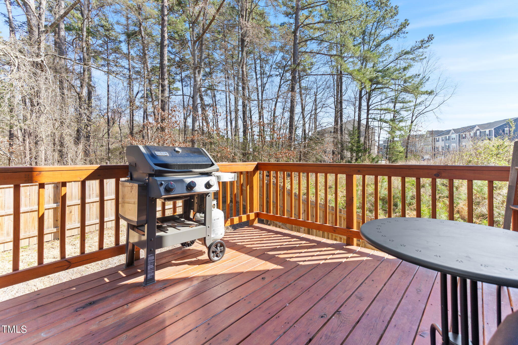 4765 Randall Road Durham, NC 27707 - Photo 28 of 30 a view of a chairs on wooden deck