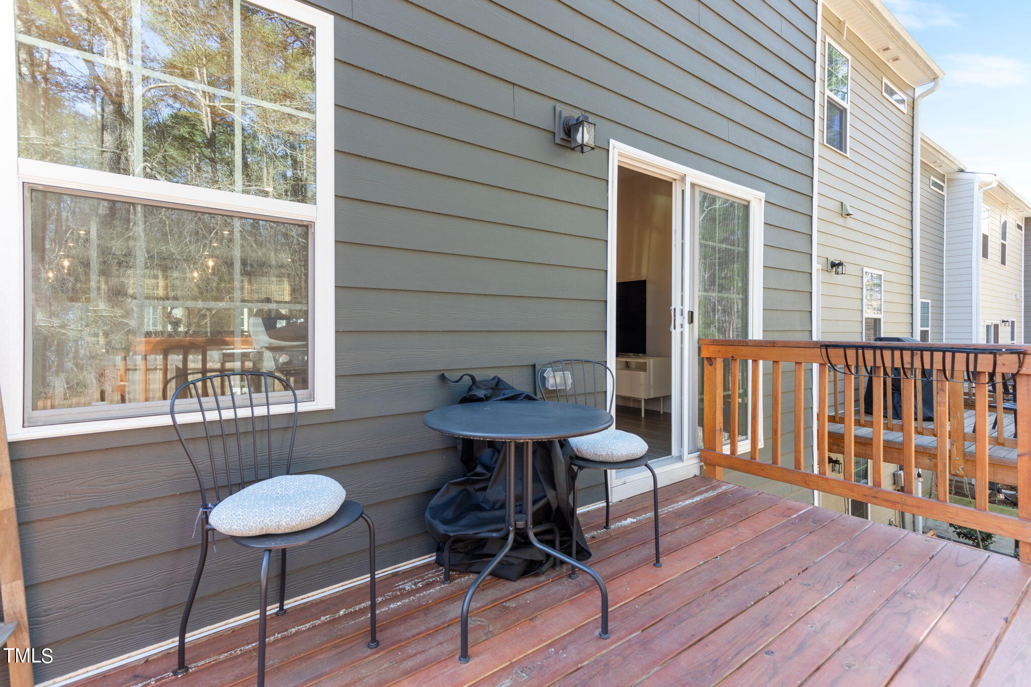 4765 Randall Road Durham, NC 27707 - Photo 30 of 30 a view of a table and chairs in roof deck