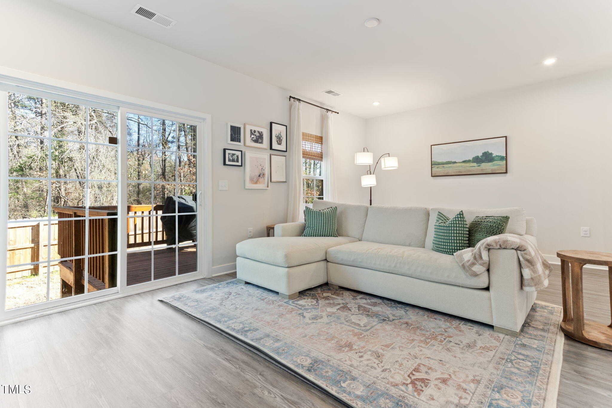4765 Randall Road Durham, NC 27707 - Photo 5 of 30 a living room with furniture and a floor to ceiling window
