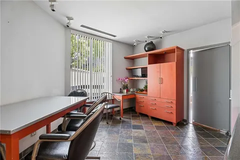 a room with furniture and window