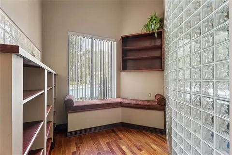 a room with window and wooden floor