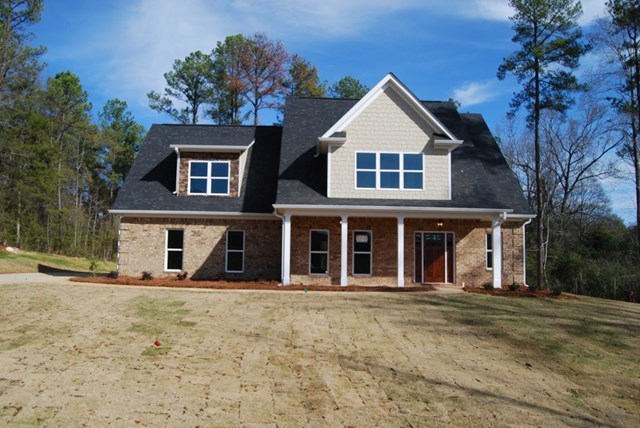 10 Laurel Ridge Forsyth, GA 31029 - Photo 1 of 23 front view of a house with a yard