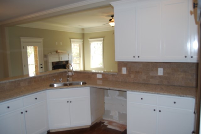 10 Laurel Ridge Forsyth, GA 31029 - Photo 7 of 23 a bathroom with a sink vanity and mirror