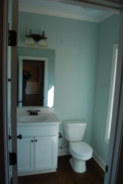 10 Laurel Ridge Forsyth, GA 31029 - Photo 9 of 23 a bathroom with a toilet and a sink