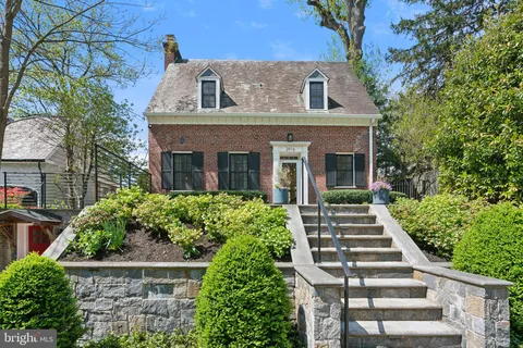 a view of a livingroom with furniture and hardwood floor