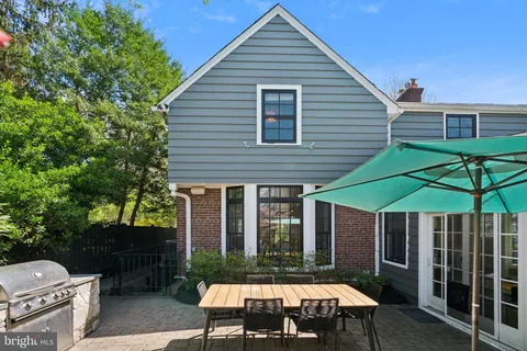 a bathroom with a sink a mirror and a bathtub