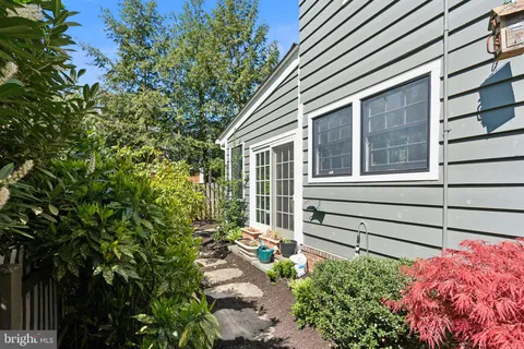 a bathroom with a sink toilet and a mirror