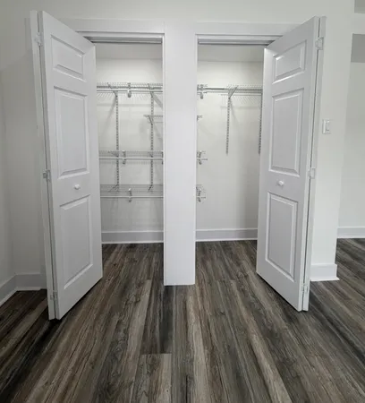 a view of bathroom with wooden floor