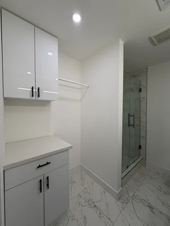 a view of a hallway with closet