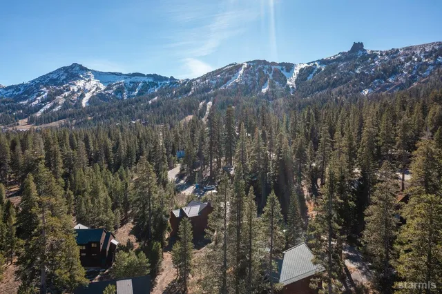 a view of a house with a mountain