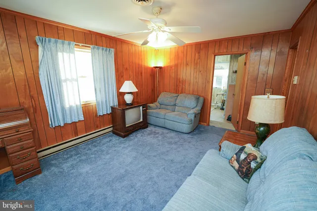 a view of storage and utility room with washer and dryer