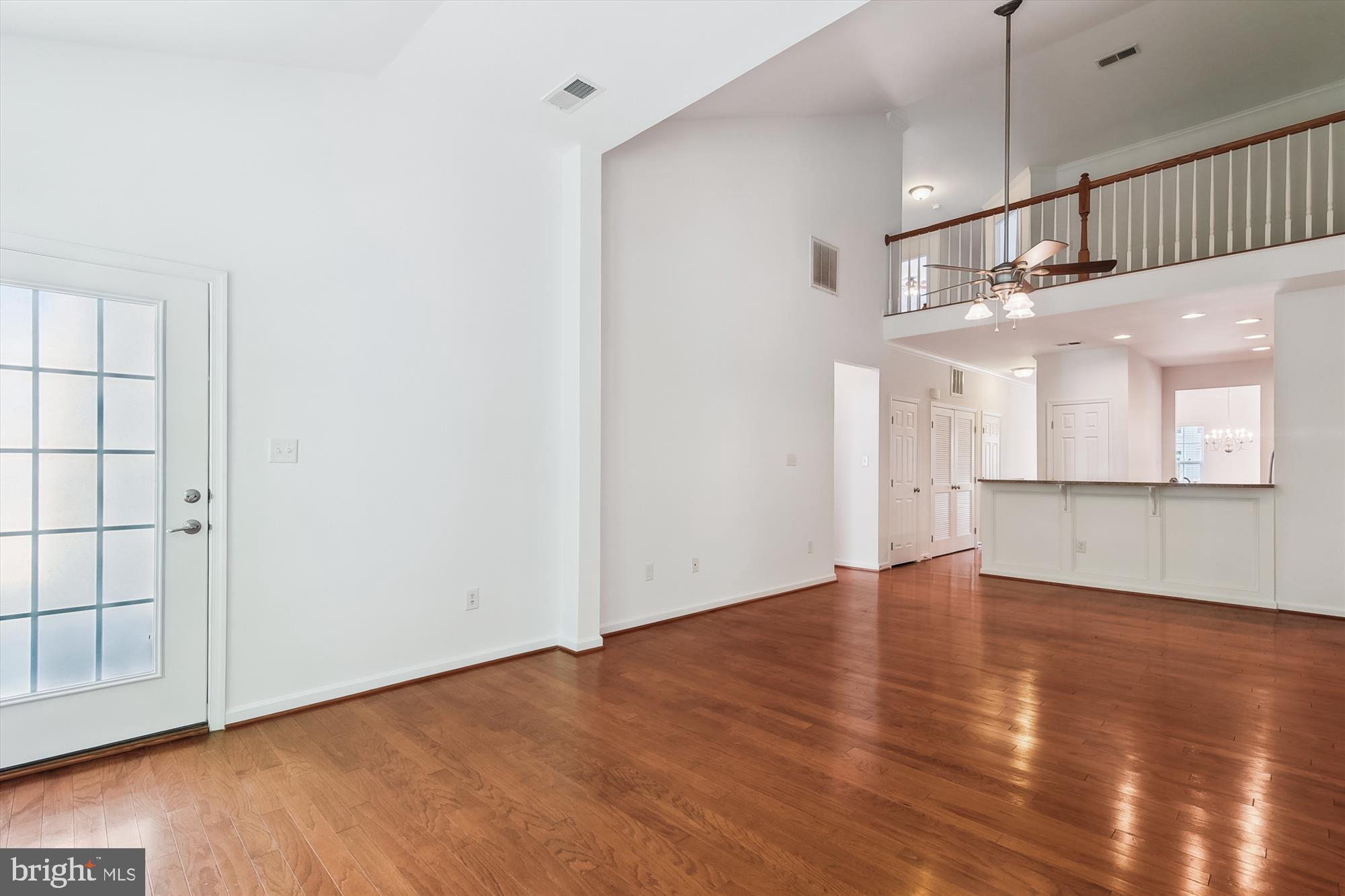 36311 Ridgeshore Lane Millville, DE 19967 - Photo 11 of 36 a view of a kitchen with wooden floor and a window