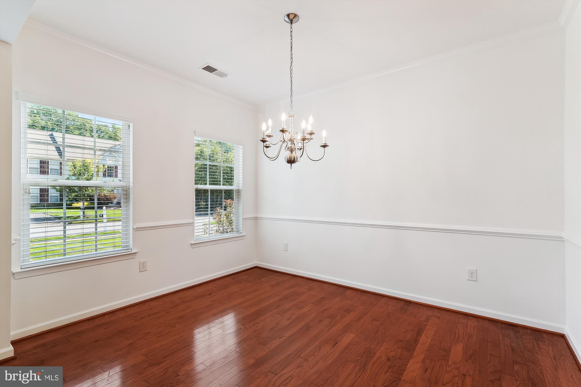 36311 Ridgeshore Lane Millville, DE 19967 - Photo 12 of 36 a view of a room with wooden floor and windows