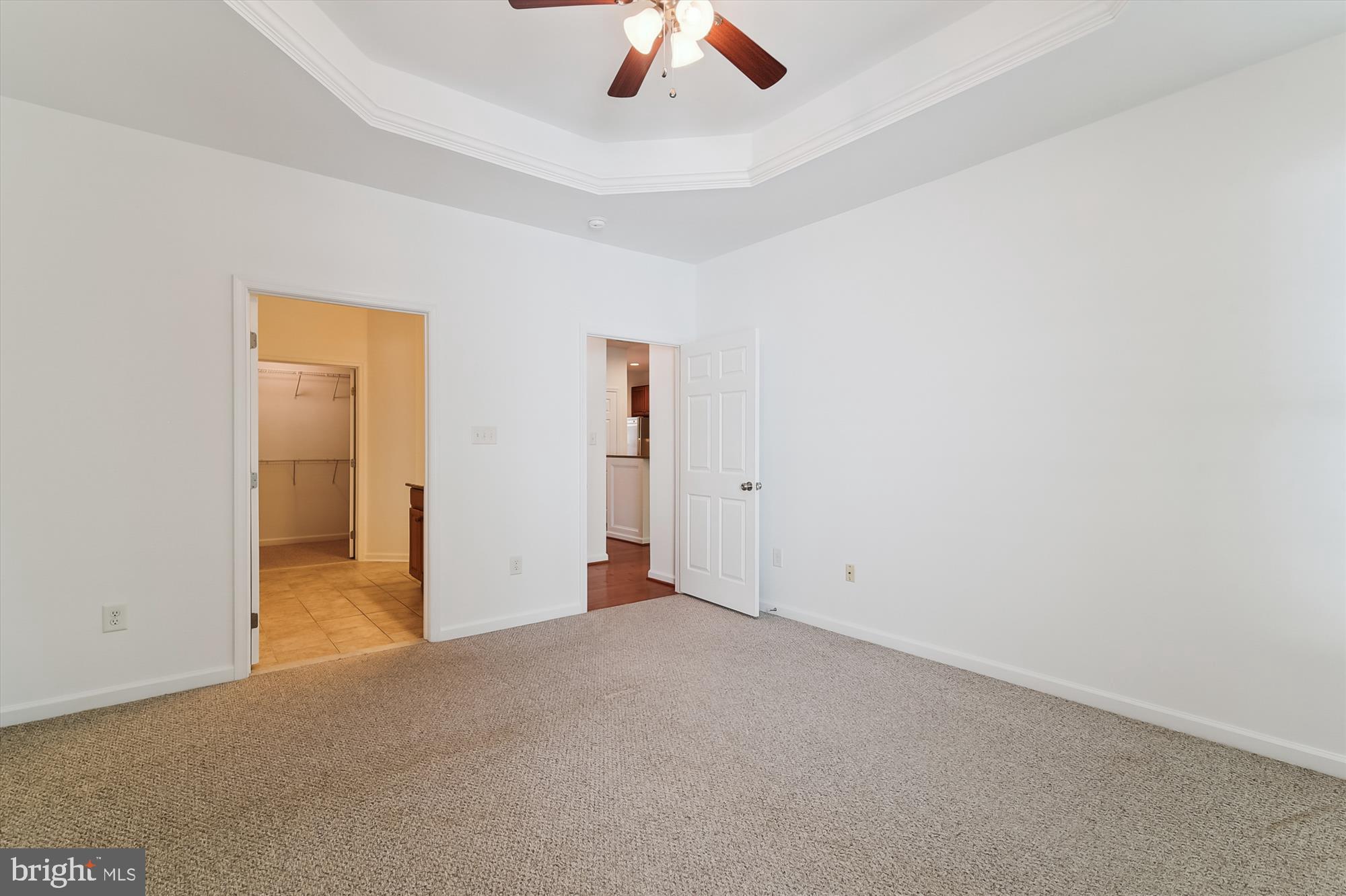 36311 Ridgeshore Lane Millville, DE 19967 - Photo 14 of 36 an empty room with a ceiling fan and a window