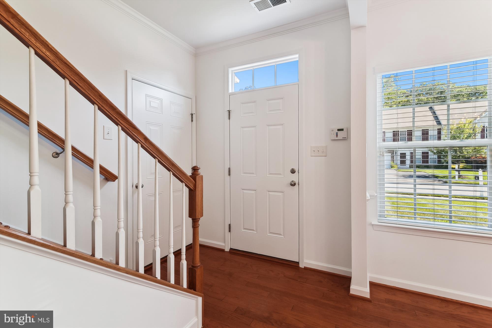 36311 Ridgeshore Lane Millville, DE 19967 - Photo 25 of 36 a view of an entryway with wooden floor and door