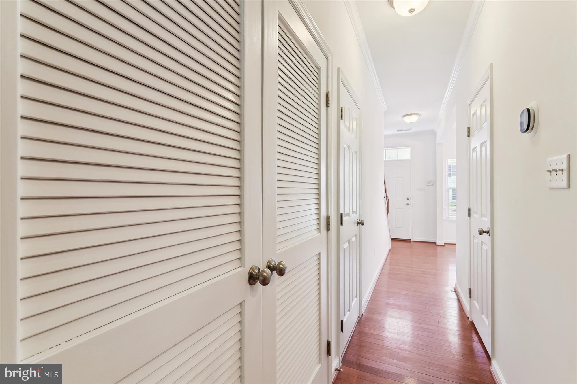 36311 Ridgeshore Lane Millville, DE 19967 - Photo 26 of 36 a view of a hallway with a wooden floor