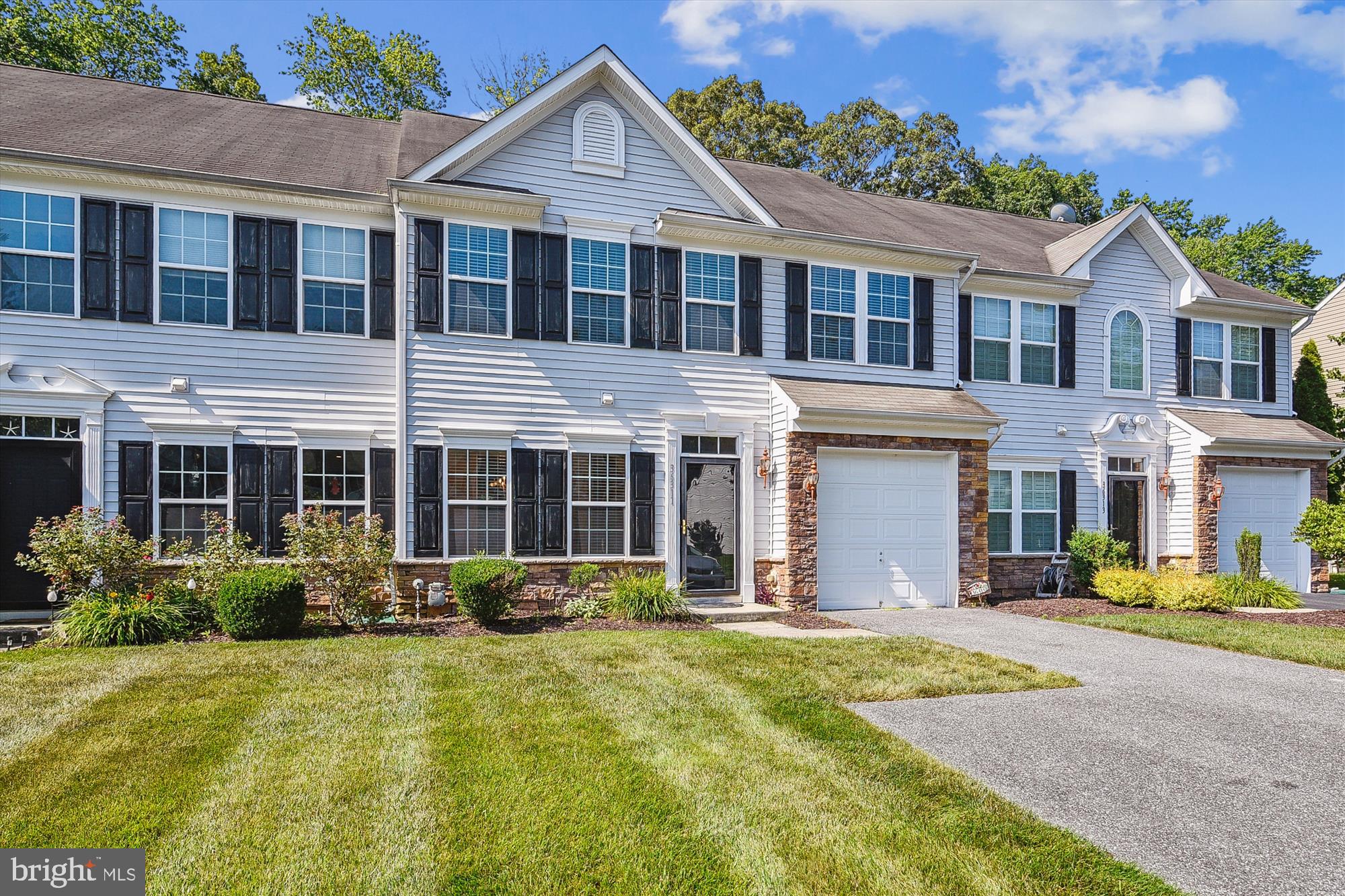 36311 Ridgeshore Lane Millville, DE 19967 - Photo 30 of 36 a front view of a house with a yard