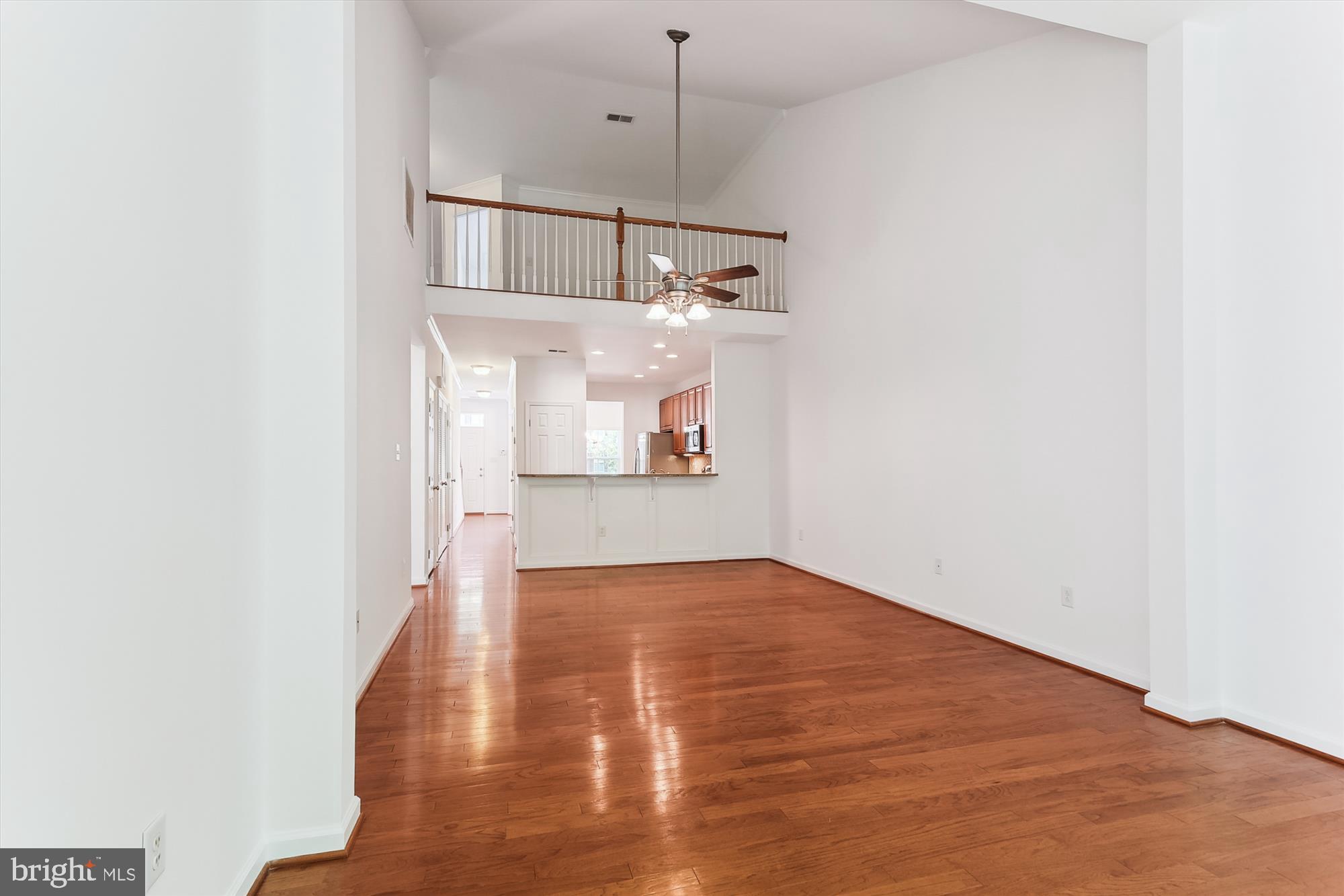36311 Ridgeshore Lane Millville, DE 19967 - Photo 8 of 36 a view of a kitchen with wooden floor