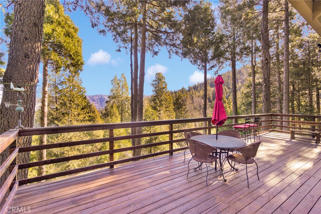 993 Mercury Way Crestline, CA 92325 - Photo 41 of 68 a view of a bench in wooden floor