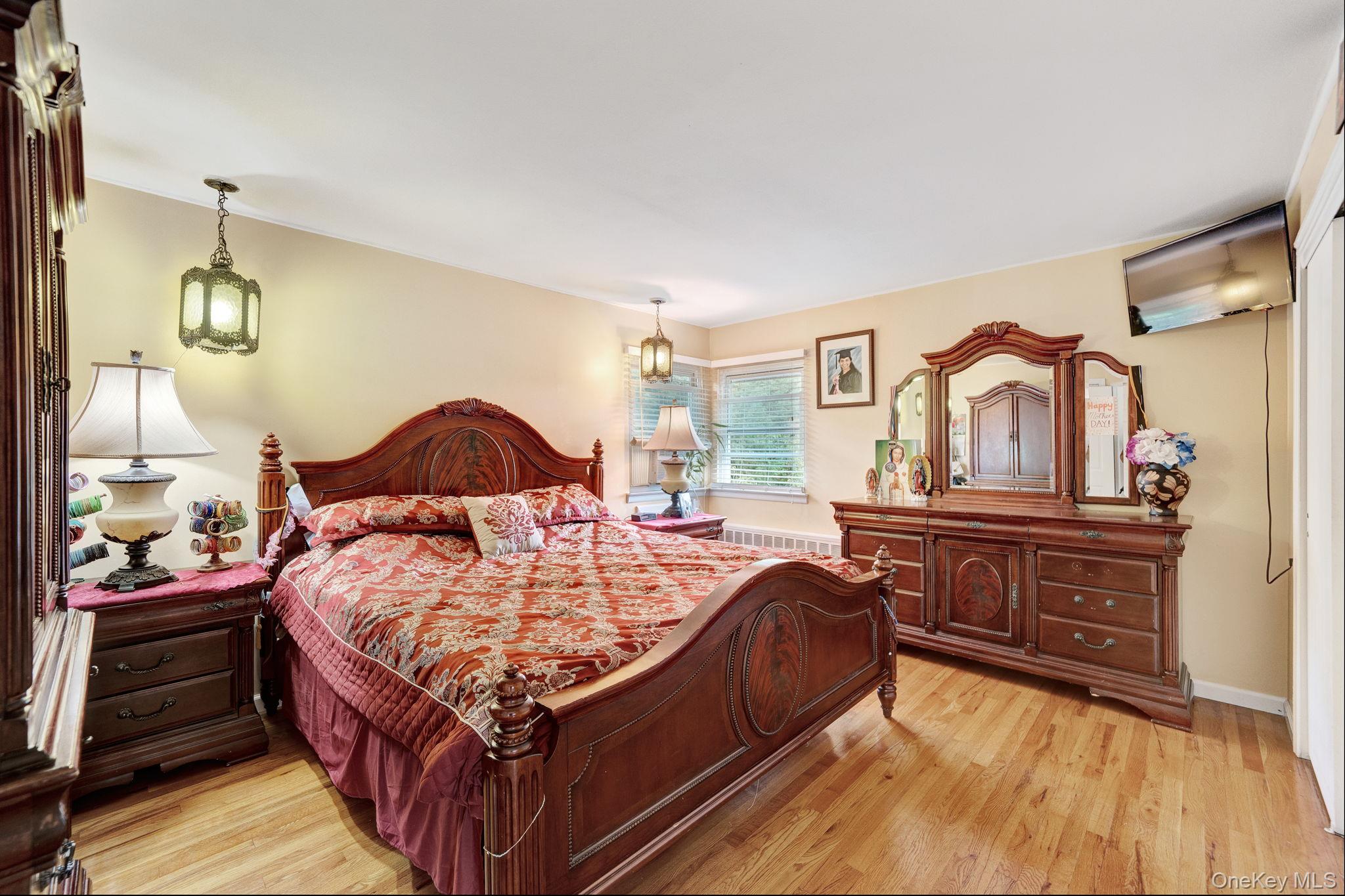 1 Wayland Road Plainview, NY 11803 - Photo 18 of 28 Bedroom with light wood finished floors