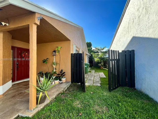 a view of a potted plants in front of door