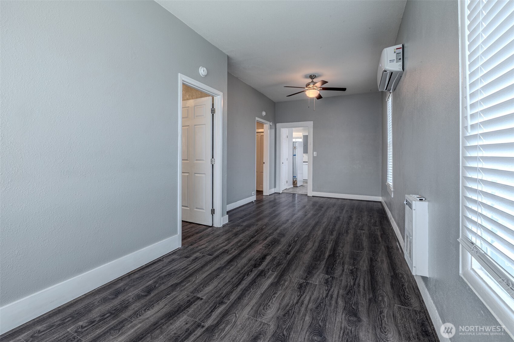 246 North Delaware Avenue Wenatchee, WA 98801 - Photo 17 of 26 wooden floor in an empty room with a window