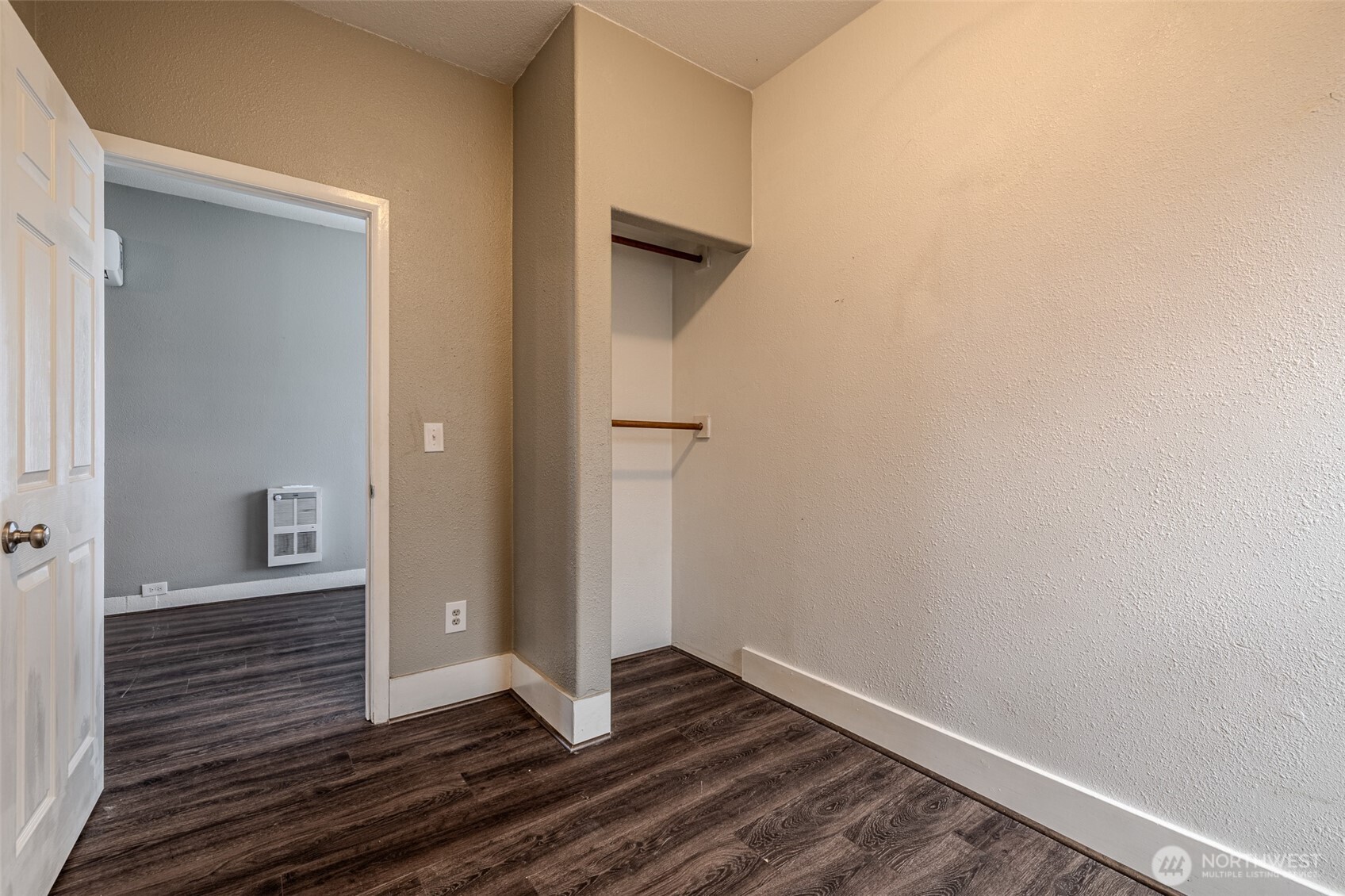 246 North Delaware Avenue Wenatchee, WA 98801 - Photo 23 of 26 a view of an empty room with wooden floor and a bathroom