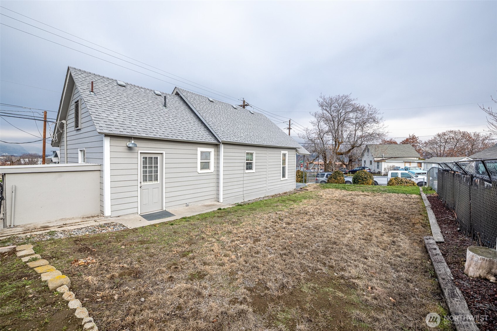 246 North Delaware Avenue Wenatchee, WA 98801 - Photo 26 of 26 a view of a house with a backyard