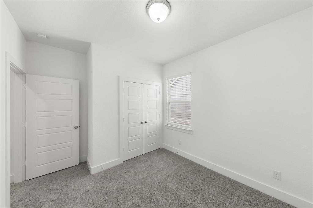 1402 Apricot Lane Gainesville, TX 76240 - Photo 11 of 11 an empty room with windows