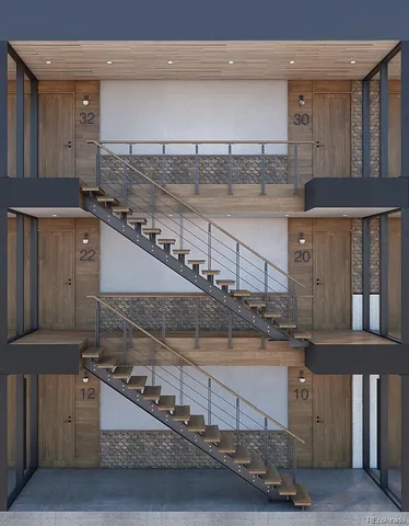 a kitchen with a stove and a refrigerator