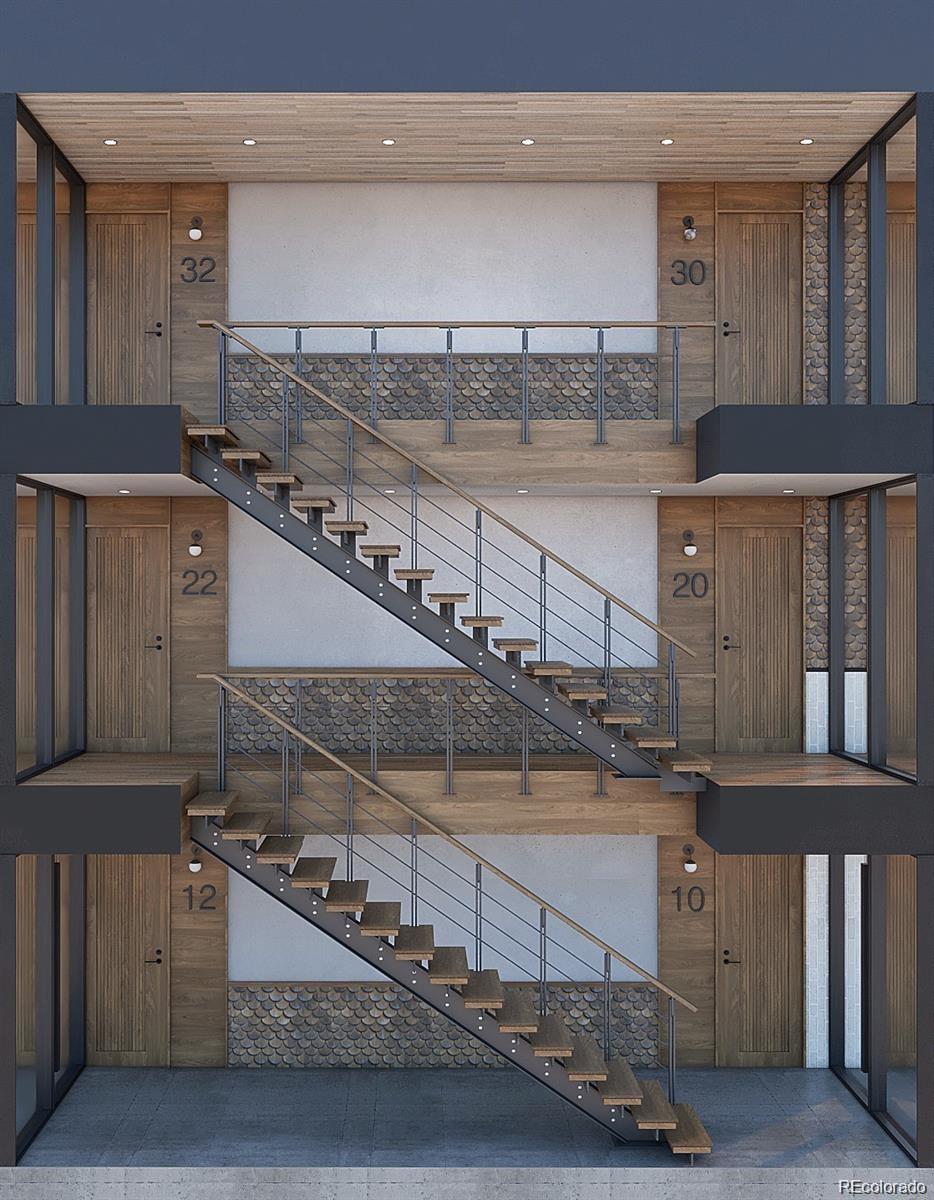 4021 Fillmore Street Denver, CO 80216 - Photo 2 of 5 a kitchen with a stove and a refrigerator