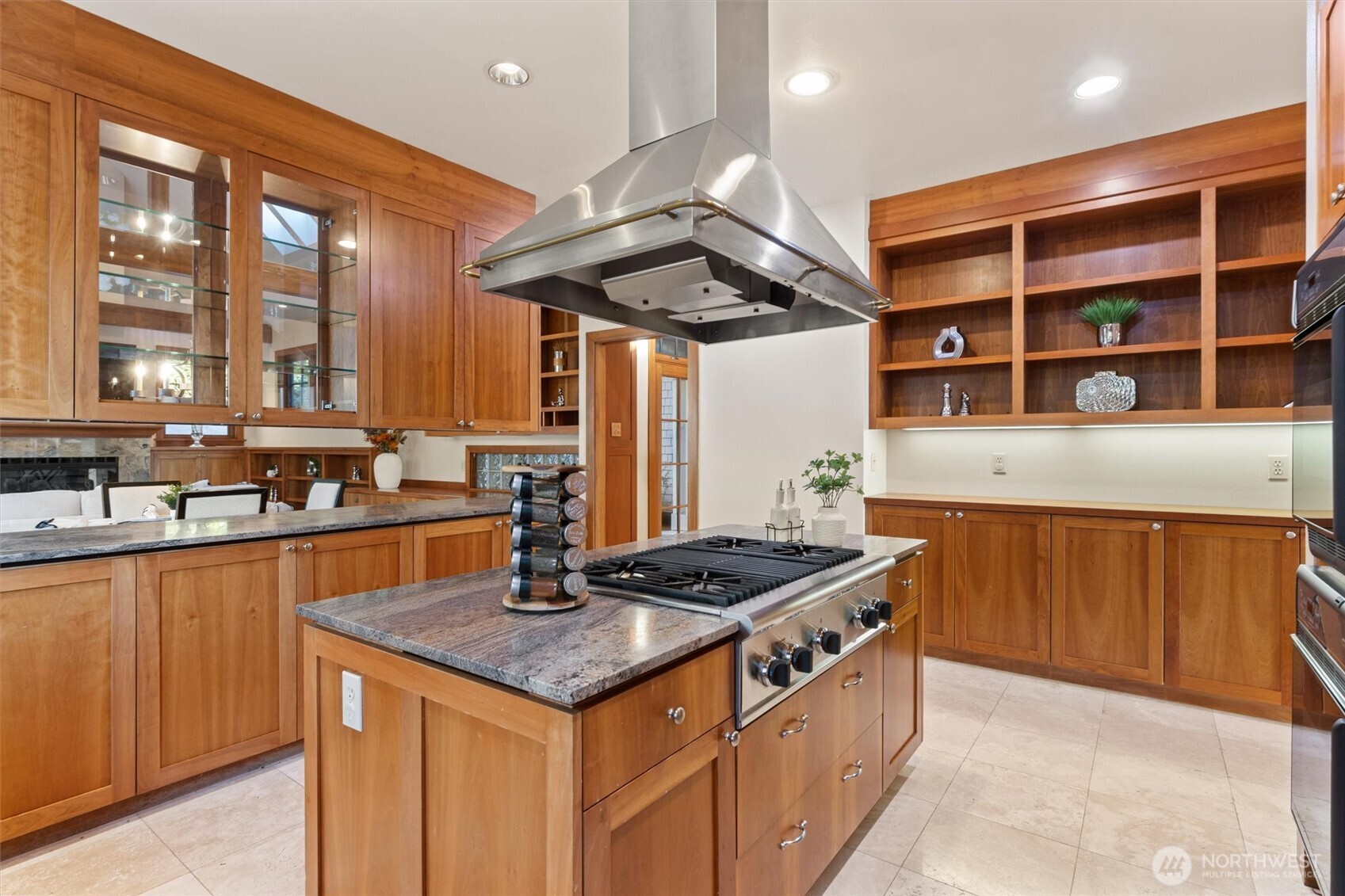 8281 West Mercer Way Mercer Island, WA 98040 - Photo 18 of 38 a kitchen with stainless steel appliances granite countertop a stove and a sink
