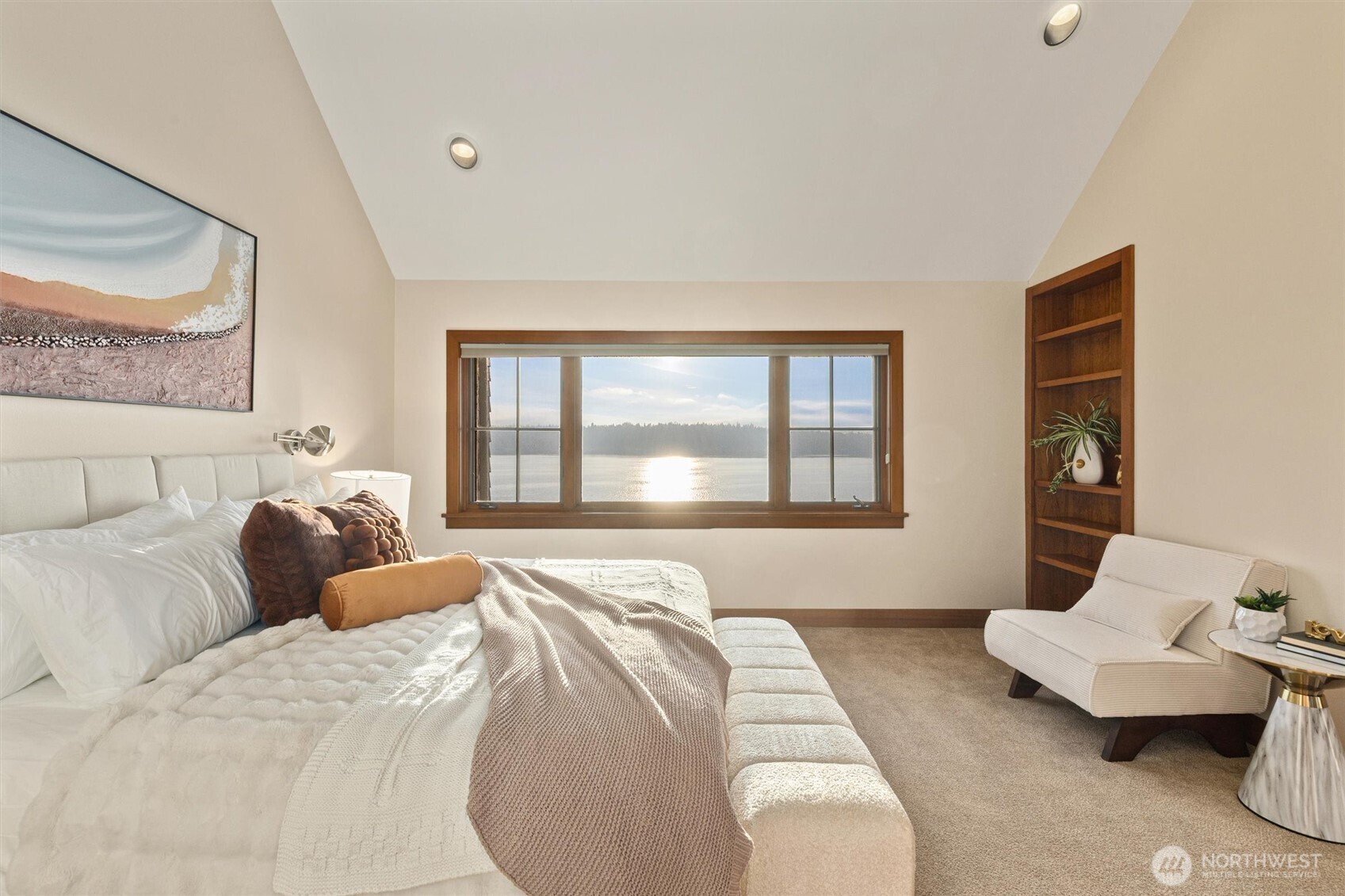 8281 West Mercer Way Mercer Island, WA 98040 - Photo 21 of 38 a bedroom with a bed and couch