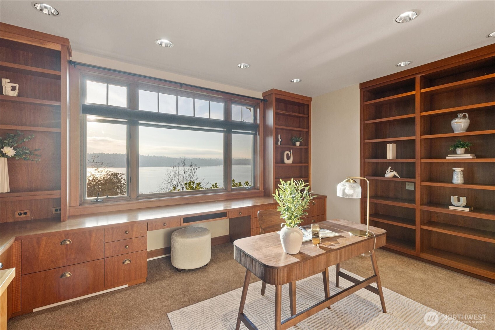 8281 West Mercer Way Mercer Island, WA 98040 - Photo 30 of 38 a room with furniture and a large window