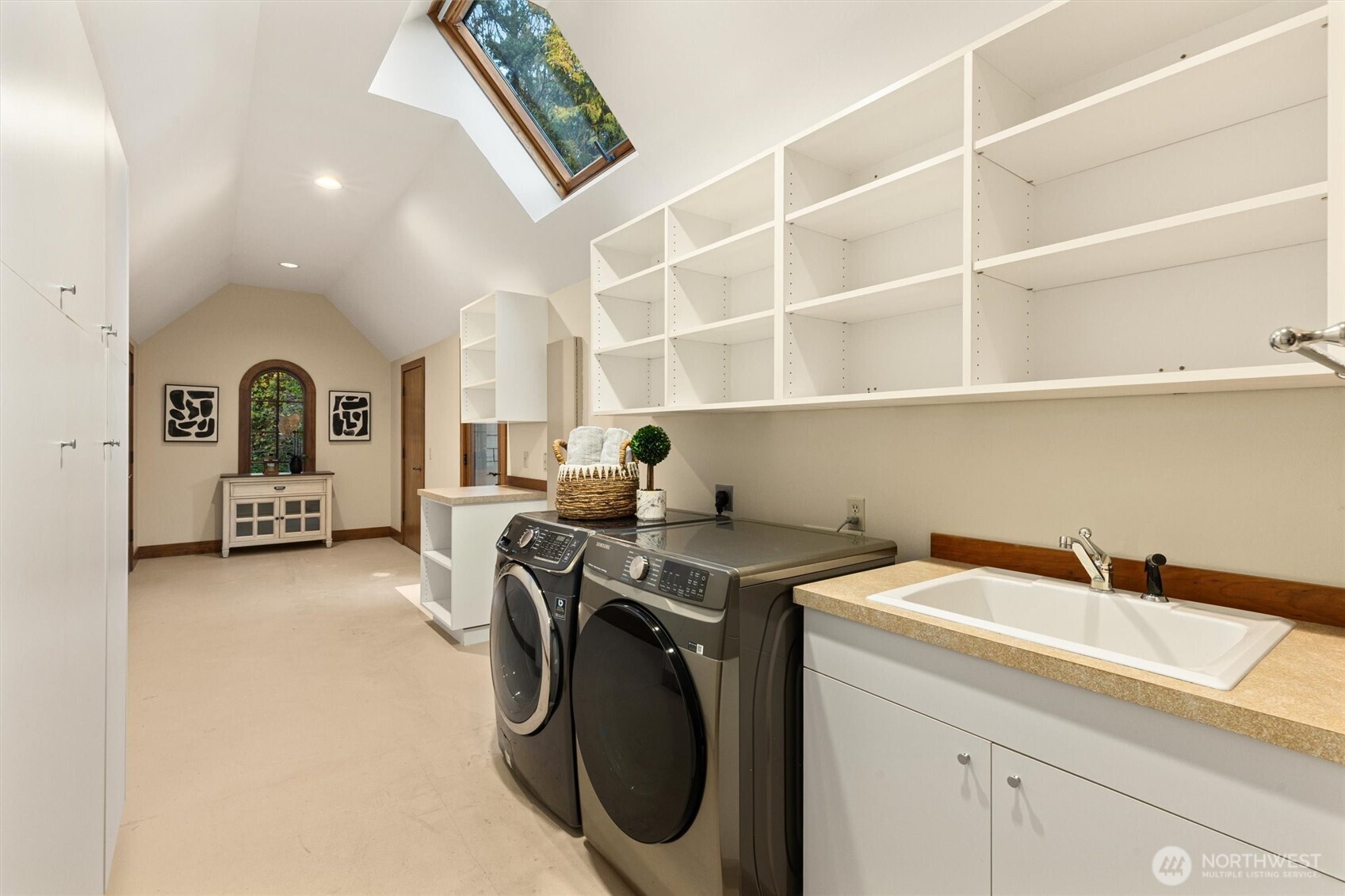 8281 West Mercer Way Mercer Island, WA 98040 - Photo 32 of 38 a utility room with sink dryer and washer