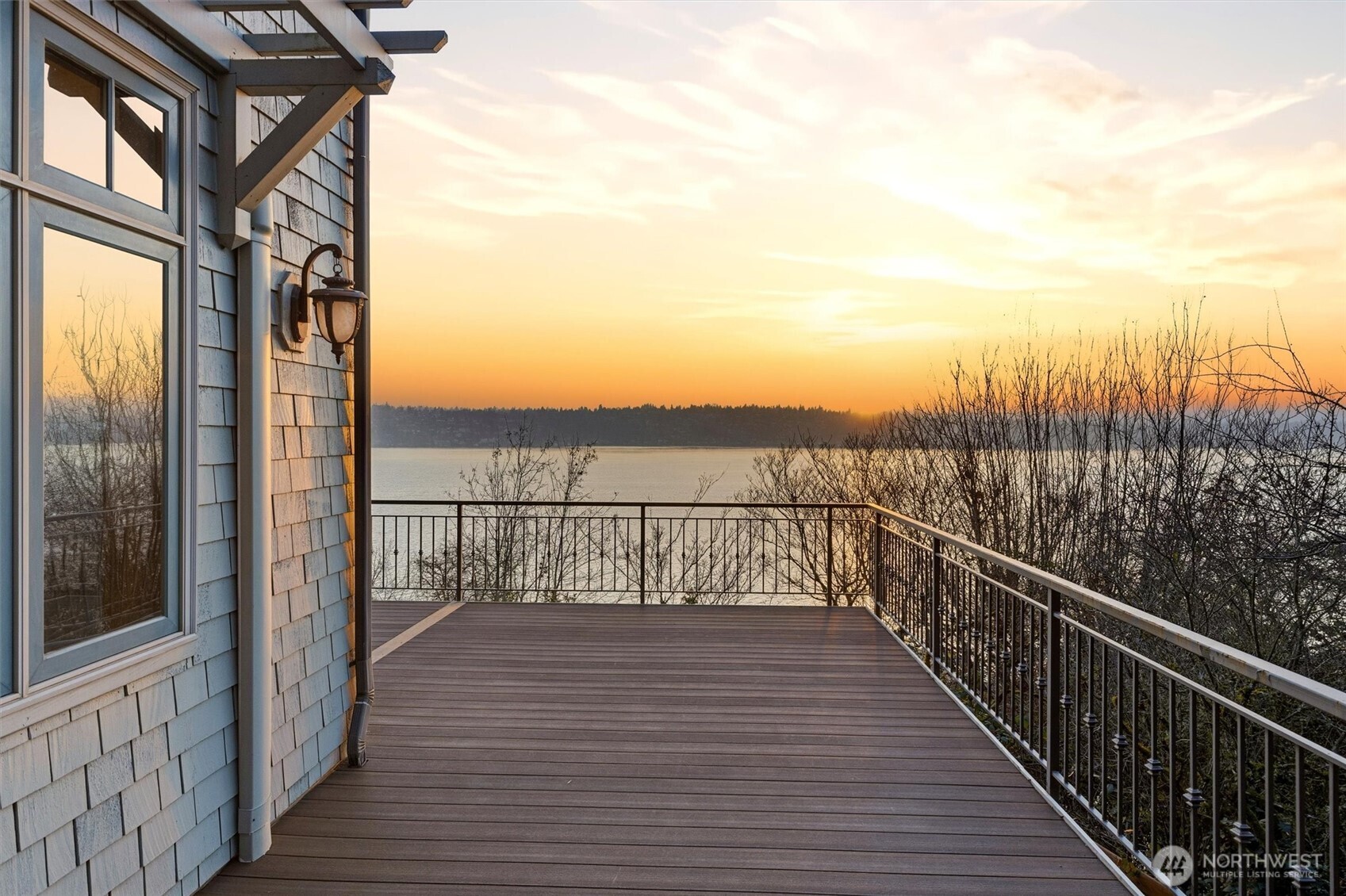 8281 West Mercer Way Mercer Island, WA 98040 - Photo 10 of 38 a view of a balcony with wooden floor and fence