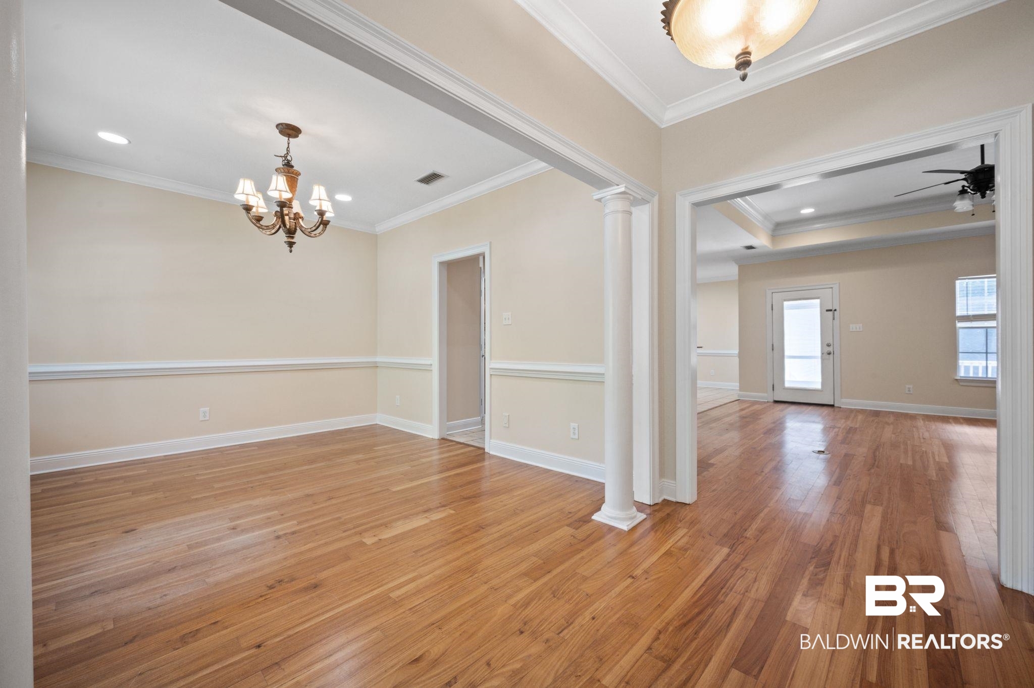 2041 Ridgeline Drive Mobile, AL 36695 - Photo 25 of 43 Unfurnished room with ornate columns, light wood-type flooring, and ornamental molding