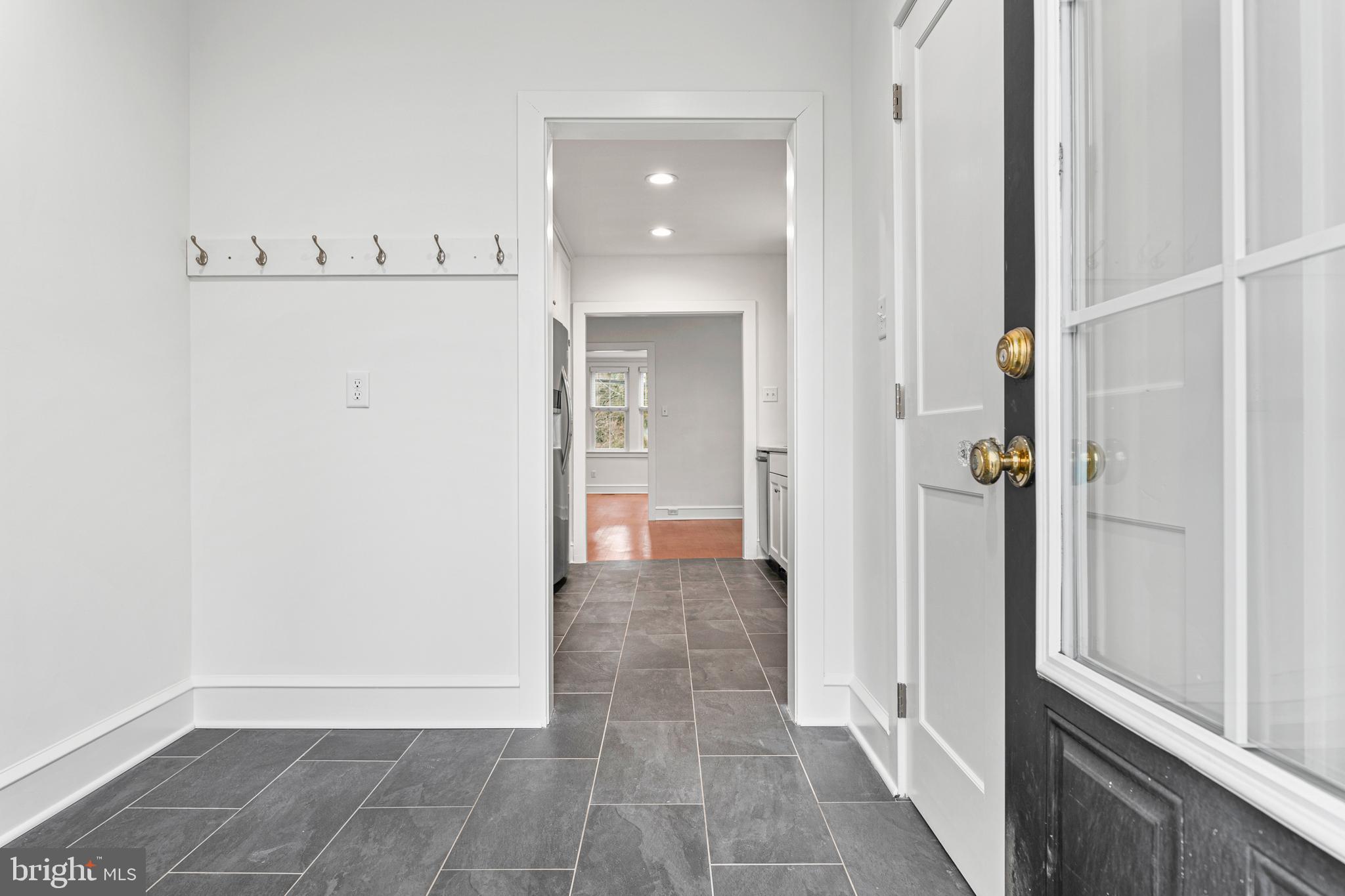312 South Devon Avenue Wayne, PA 19087 - Photo 18 of 38 a view of a hallway with wooden floor and closet