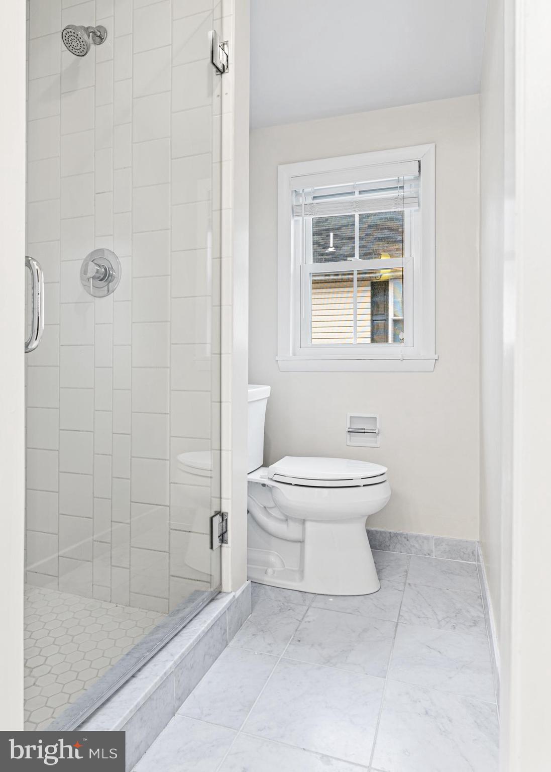 312 South Devon Avenue Wayne, PA 19087 - Photo 25 of 38 a bathroom with a toilet and a shower