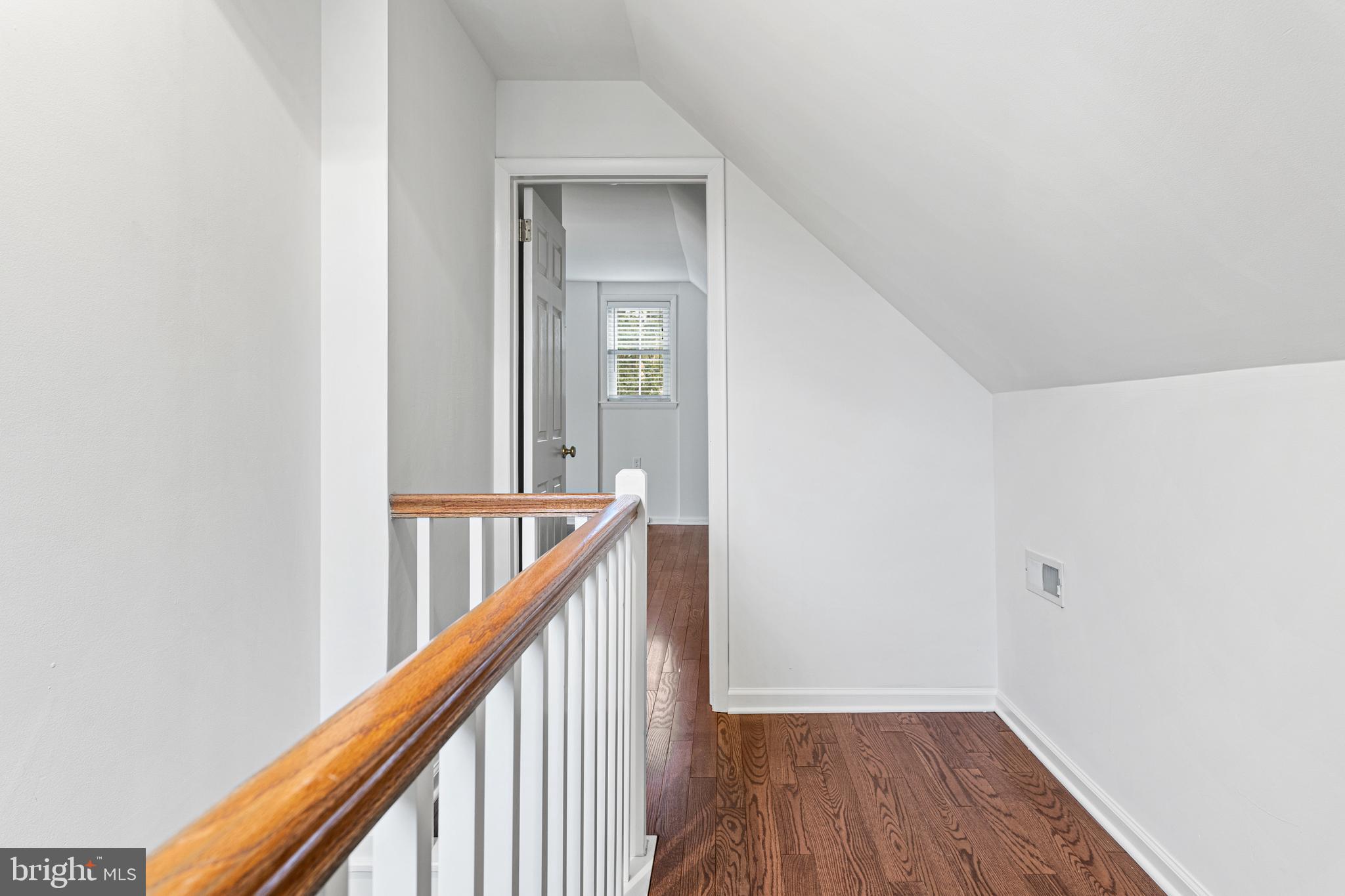 312 South Devon Avenue Wayne, PA 19087 - Photo 26 of 38 a view of a hallway with wooden floor and staircase