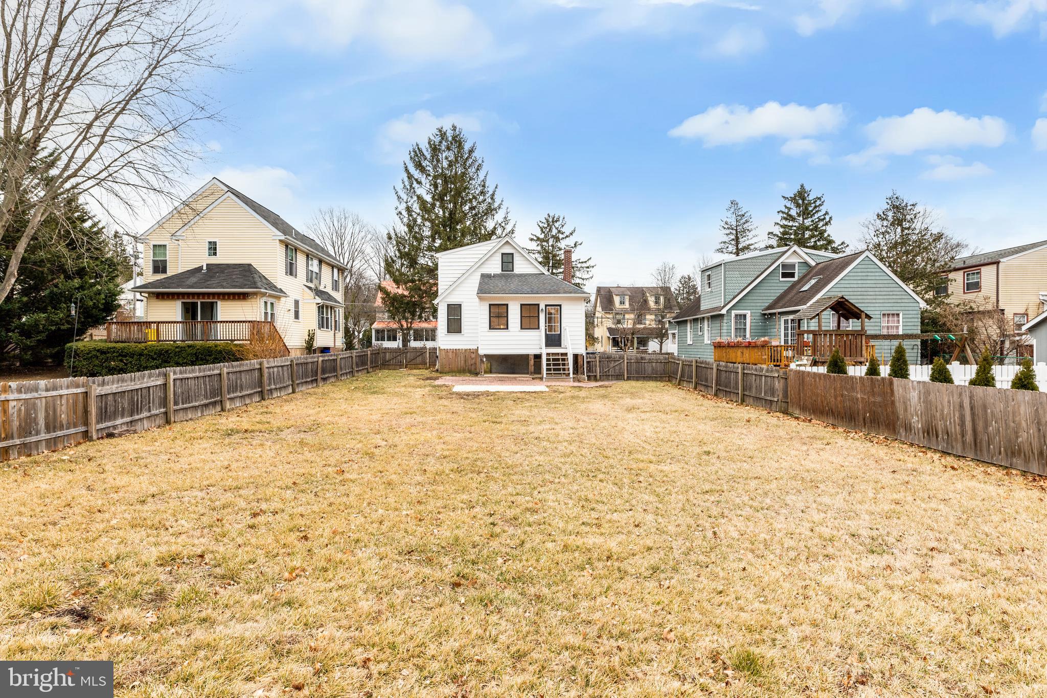 312 South Devon Avenue Wayne, PA 19087 - Photo 38 of 38 a front view of a house with a yard covered with snow